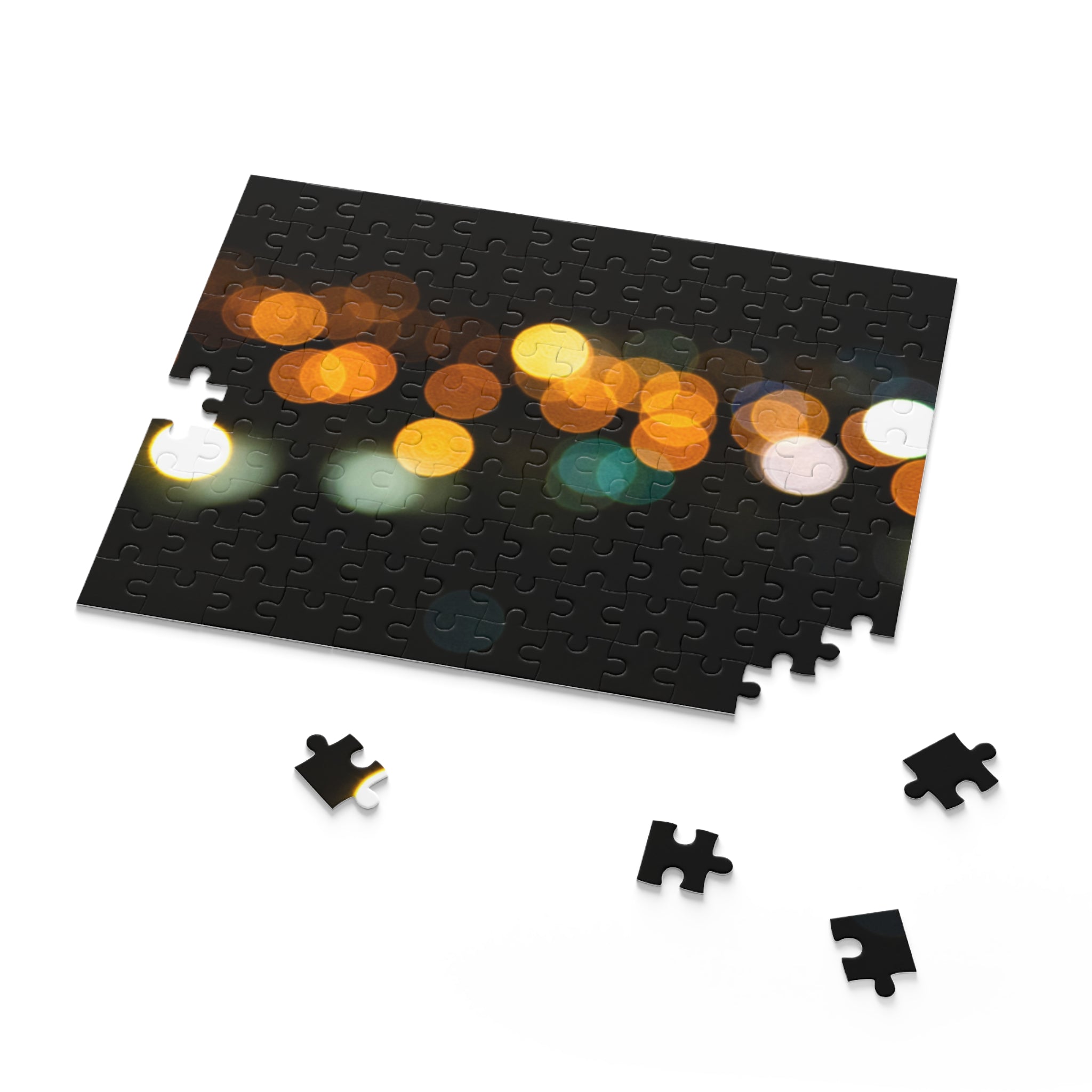 Jigsaw puzzle with blurred lights design on a black background