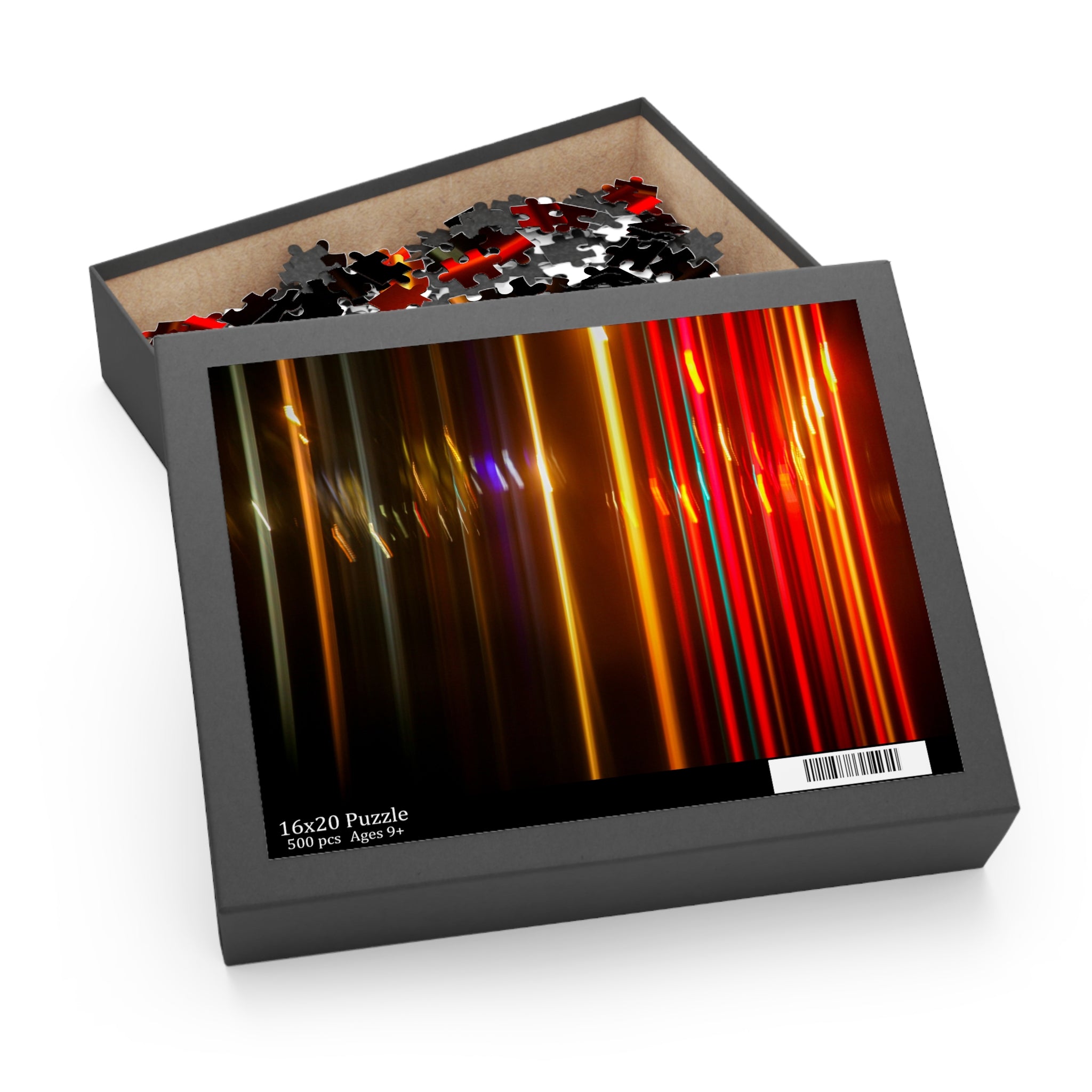 Jigsaw puzzle in a box with colorful design on a white background