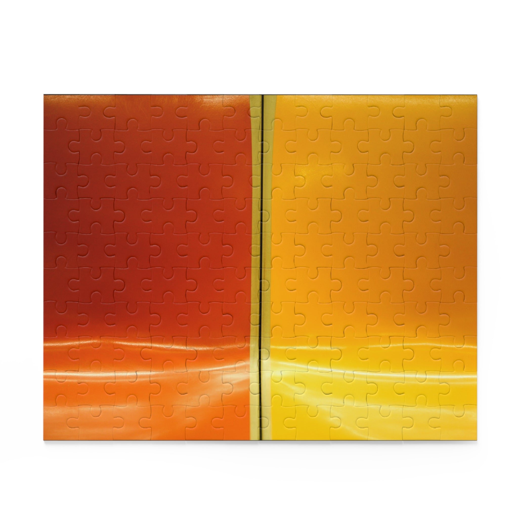 Two puzzle pieces in orange and yellow on a white background