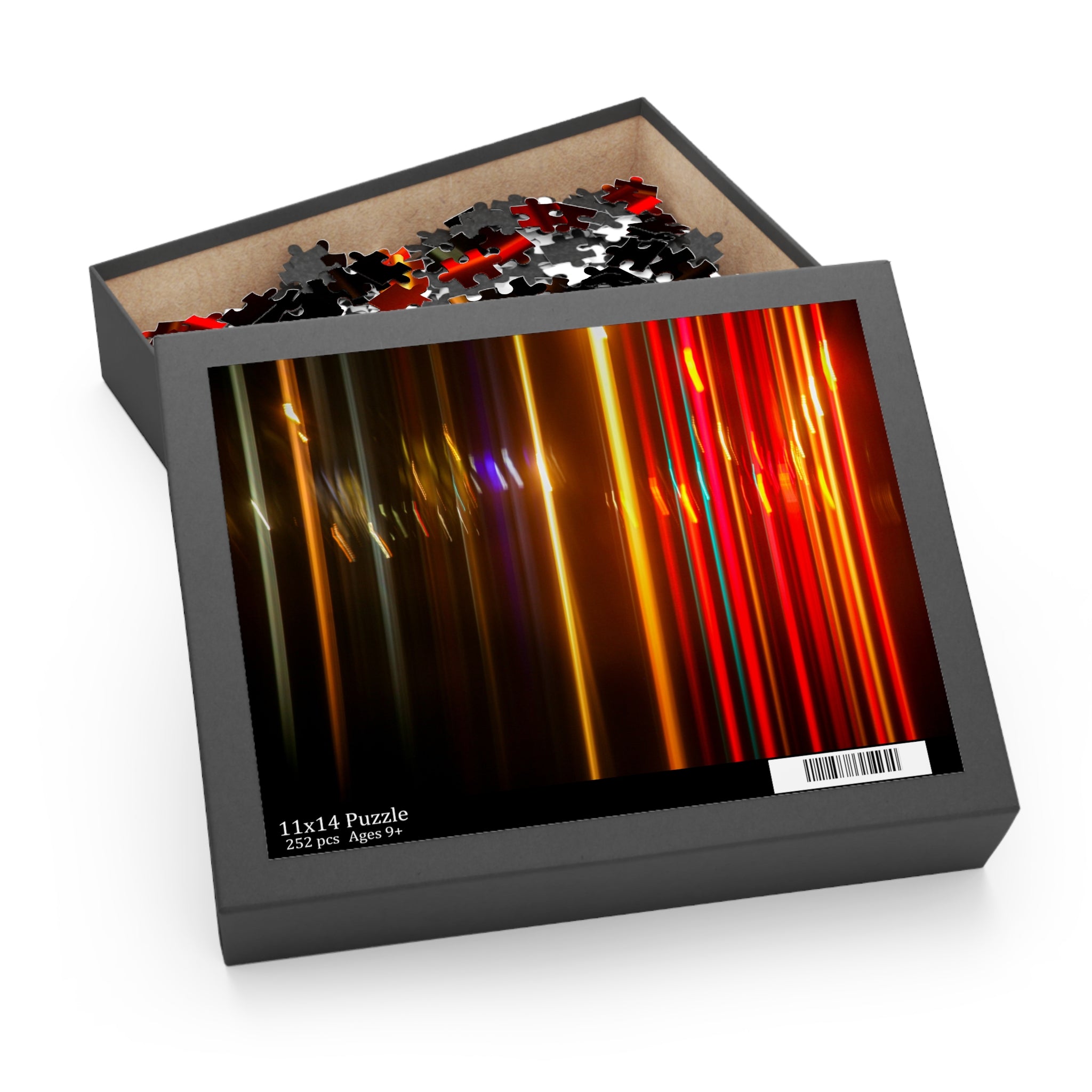 Jigsaw puzzle in a box with colorful design on a white background