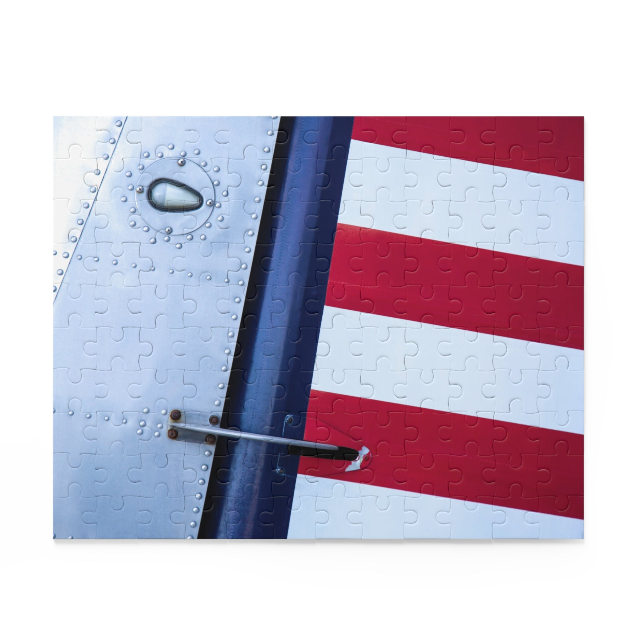 Puzzle with a close-up of an airplane's wing and American flag design on a white background