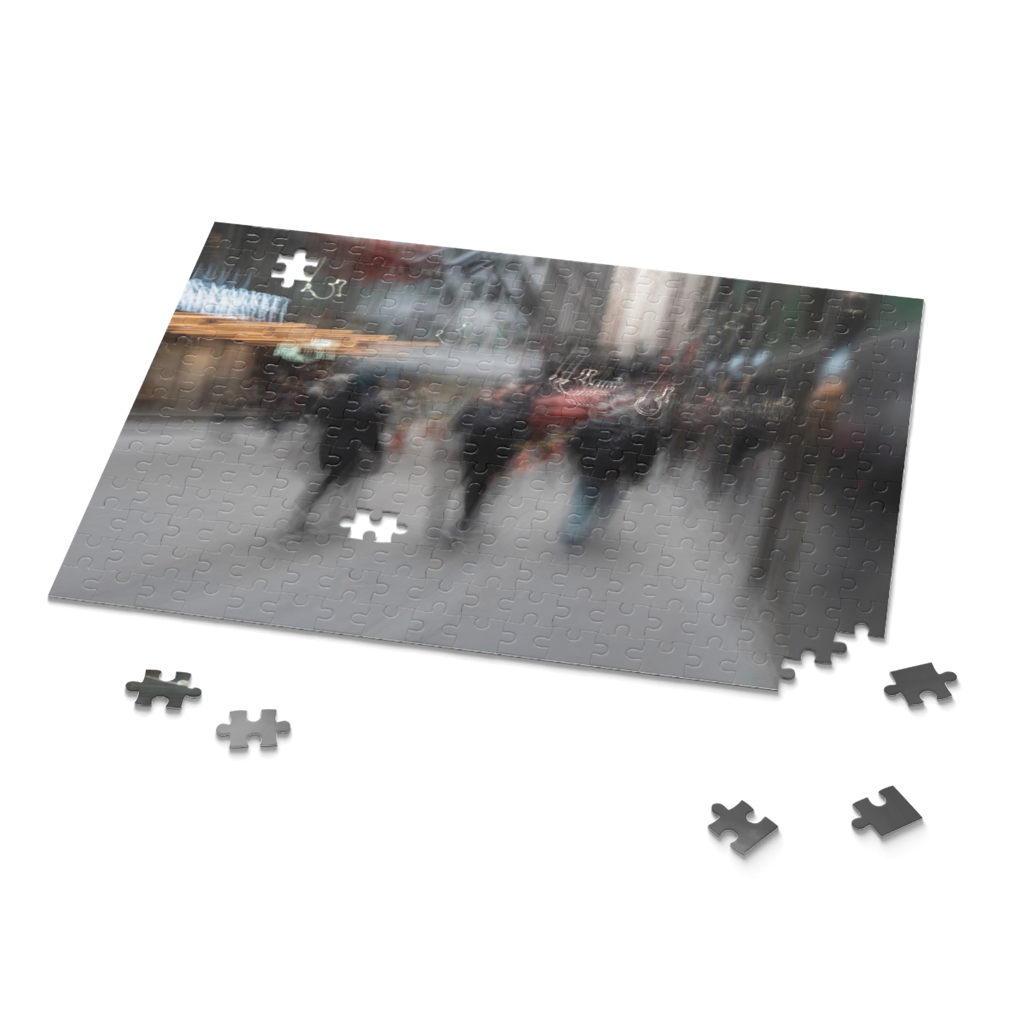 Jigsaw puzzle with a partially completed scene of people walking in the rain on a white background