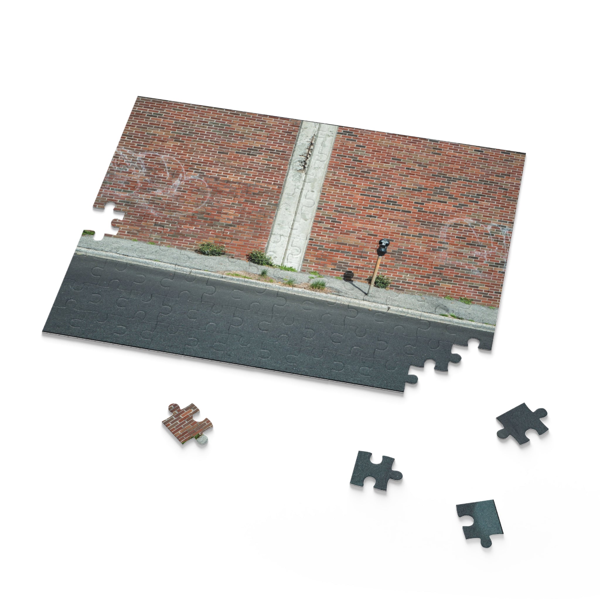 Jigsaw puzzle with pieces showing a street scene with a brick wall.