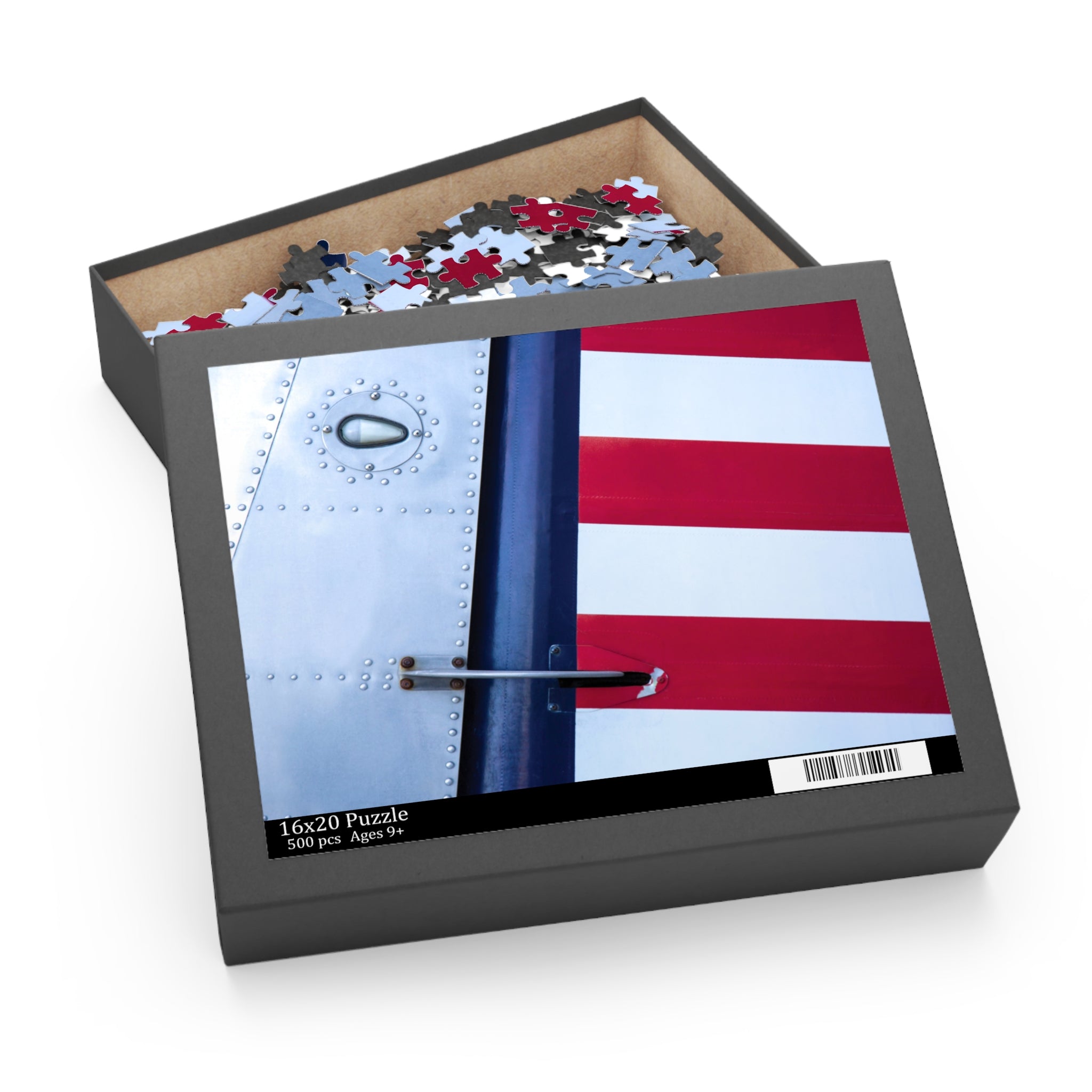 Puzzle box with a U.S. flag design on the lid, containing a partially completed puzzle.