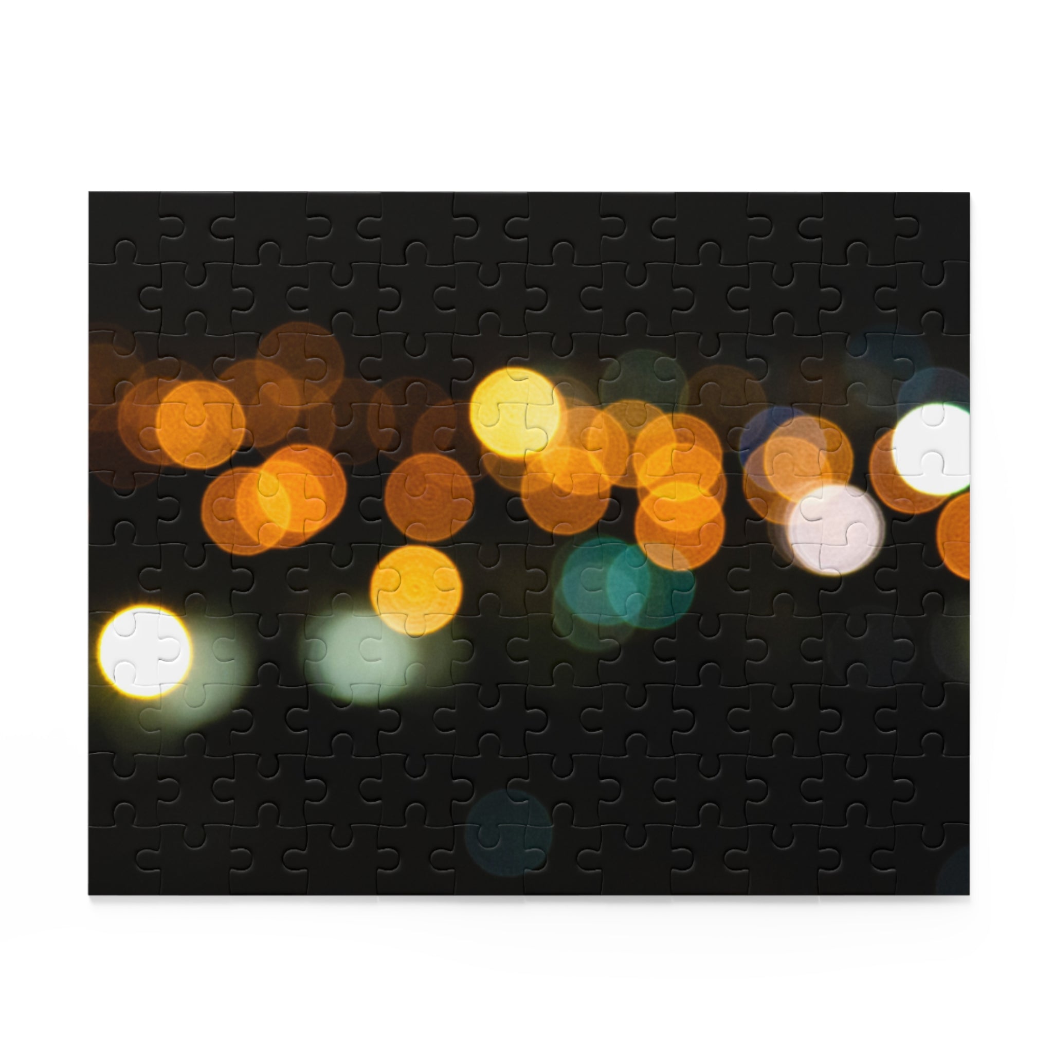 Jigsaw puzzle with blurred lights design on a white background