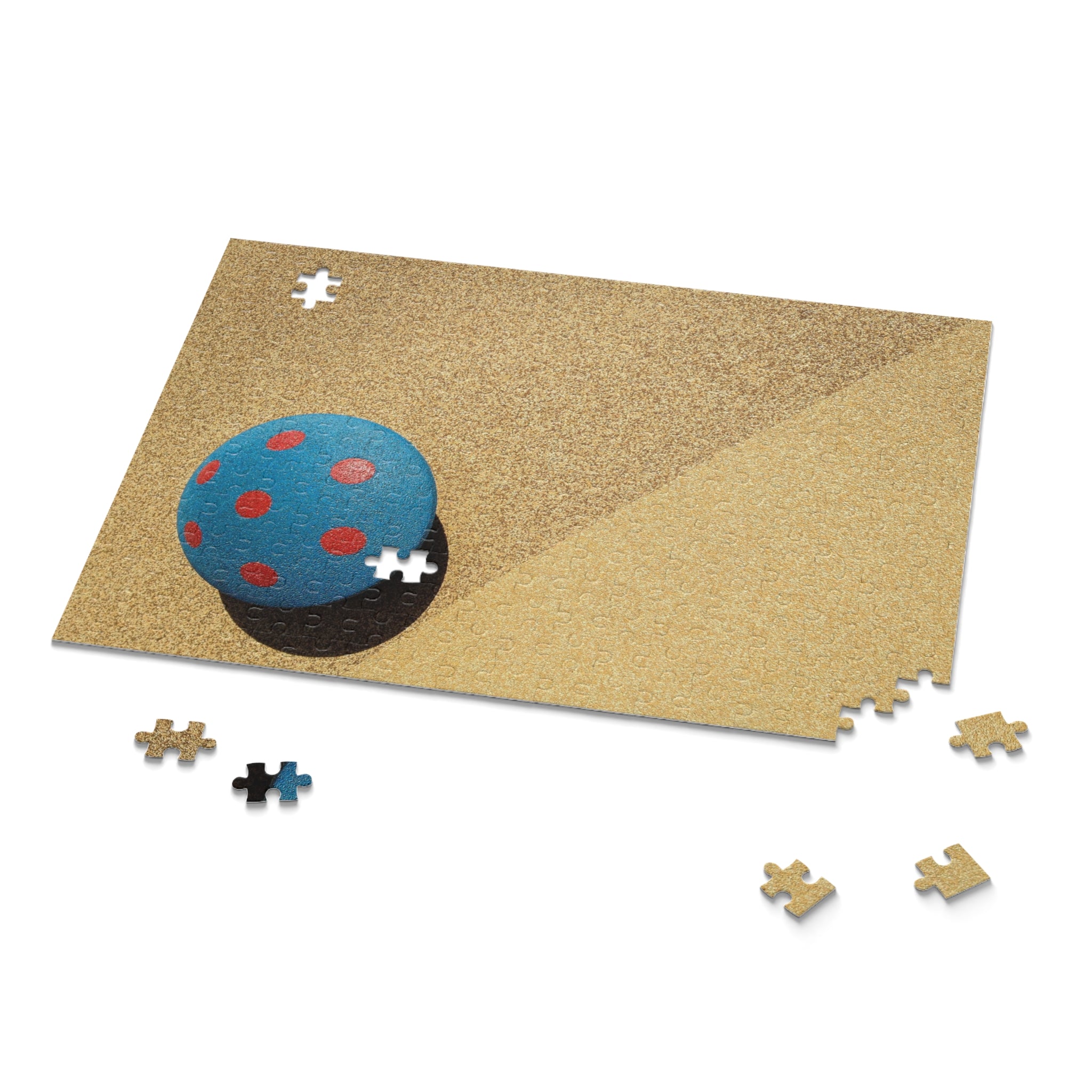 Jigsaw puzzle with a blue character on a beige mat