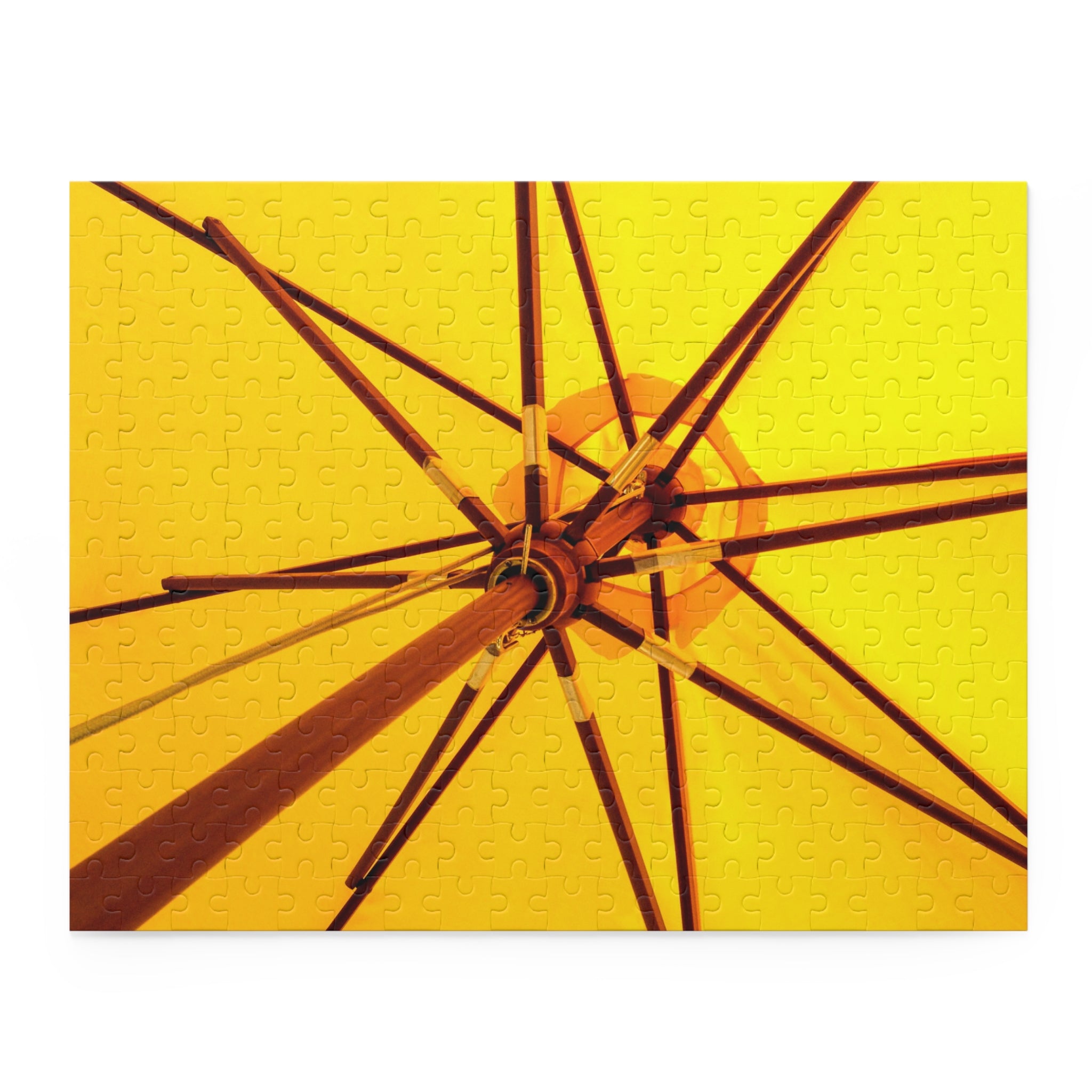 Close-up of an umbrella with a yellow background