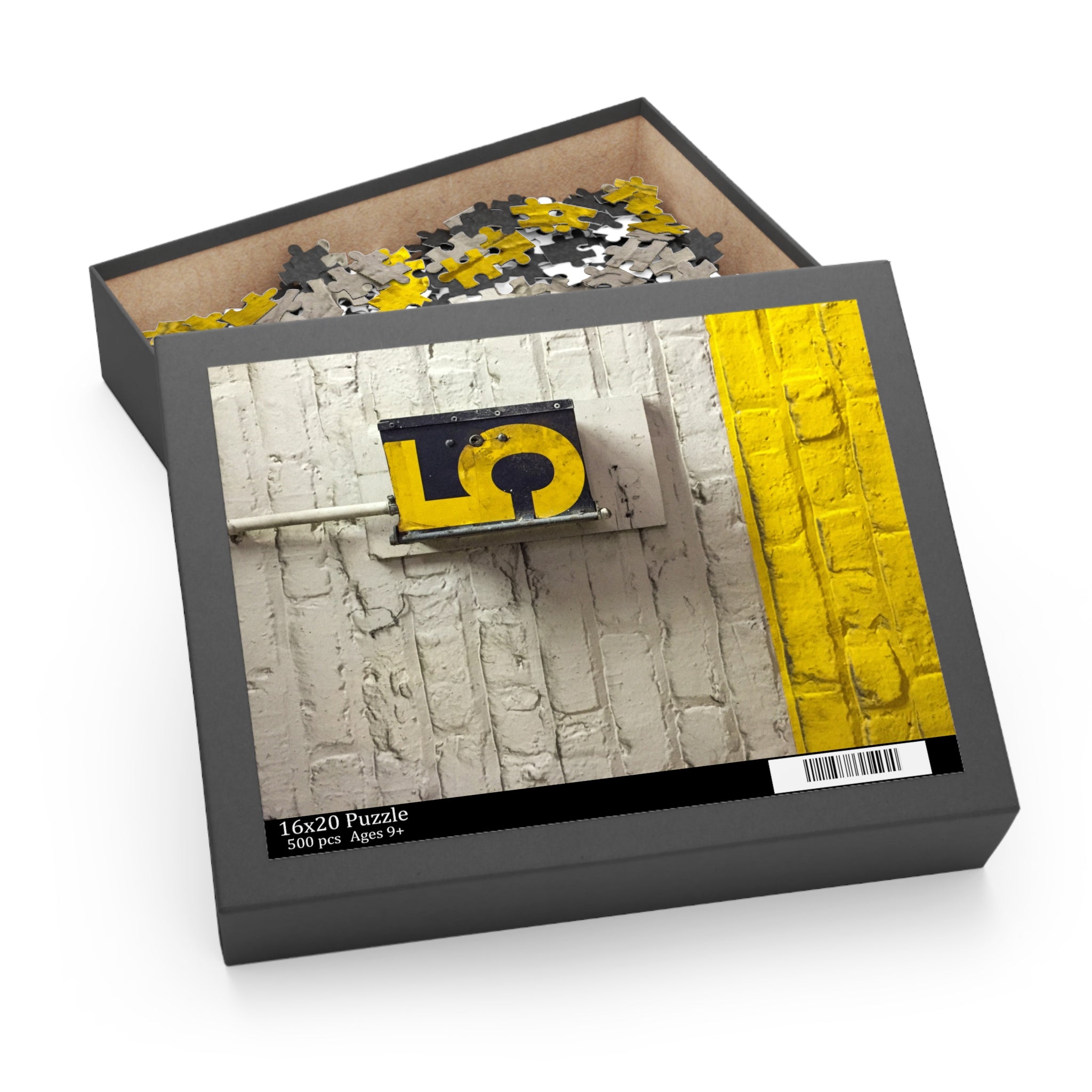 Jigsaw puzzle in a box with a yellow lock design on a white background