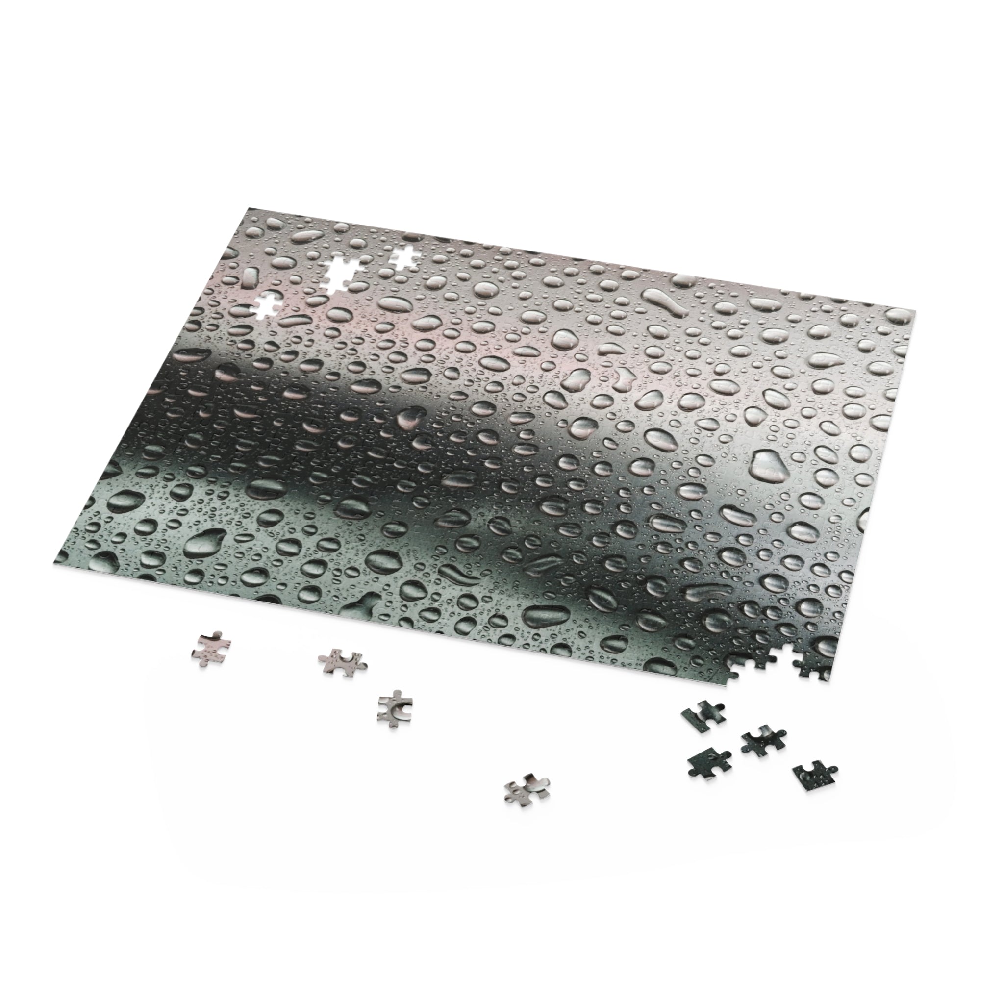 Jigsaw puzzle with water droplet design on a white background