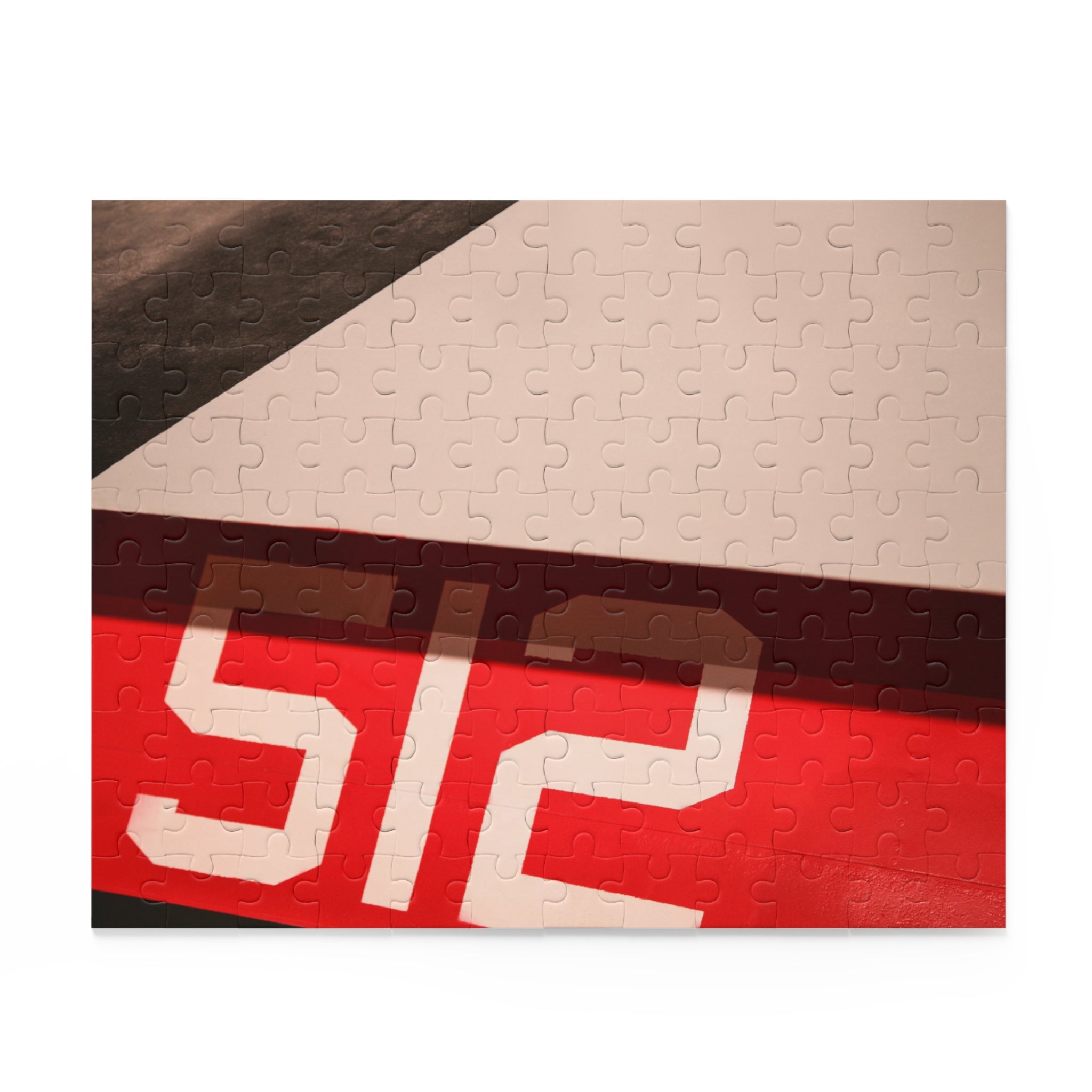 Jigsaw puzzle with a partially completed design on a white background