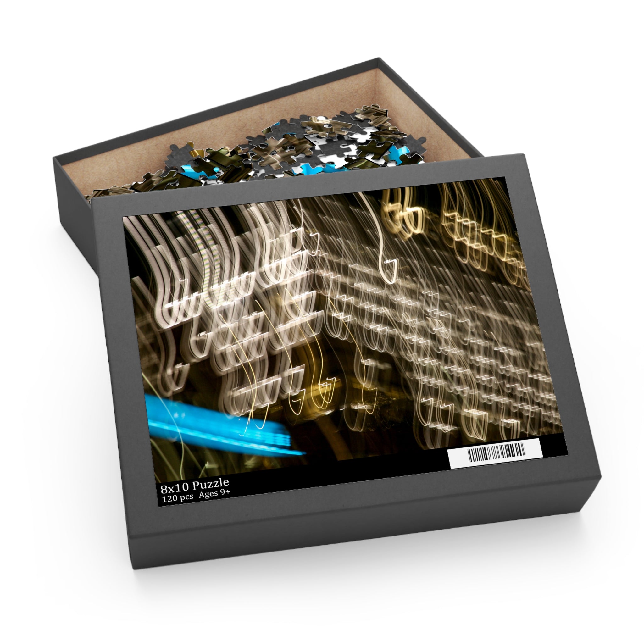 Jigsaw puzzle in a box with a colorful abstract design on the cover