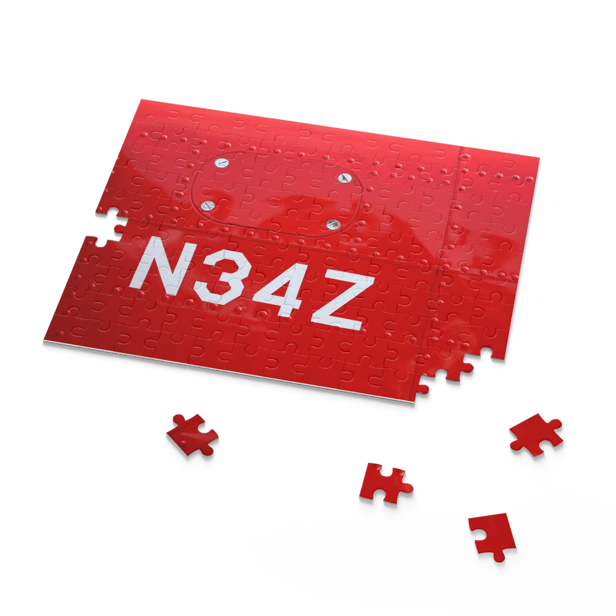 Red puzzle with pieces missing, revealing the letters 'N34Z' on a white background