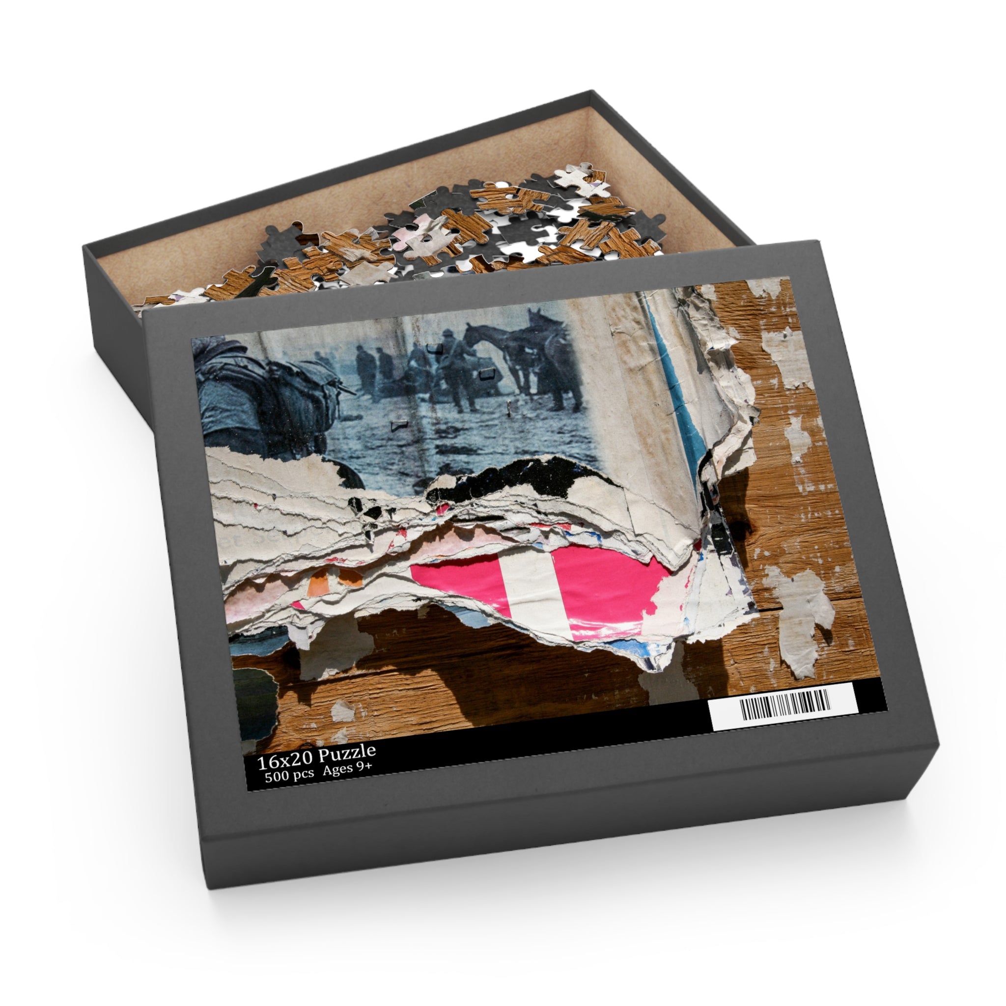 Jigsaw puzzle in a box with a partially completed puzzle on top