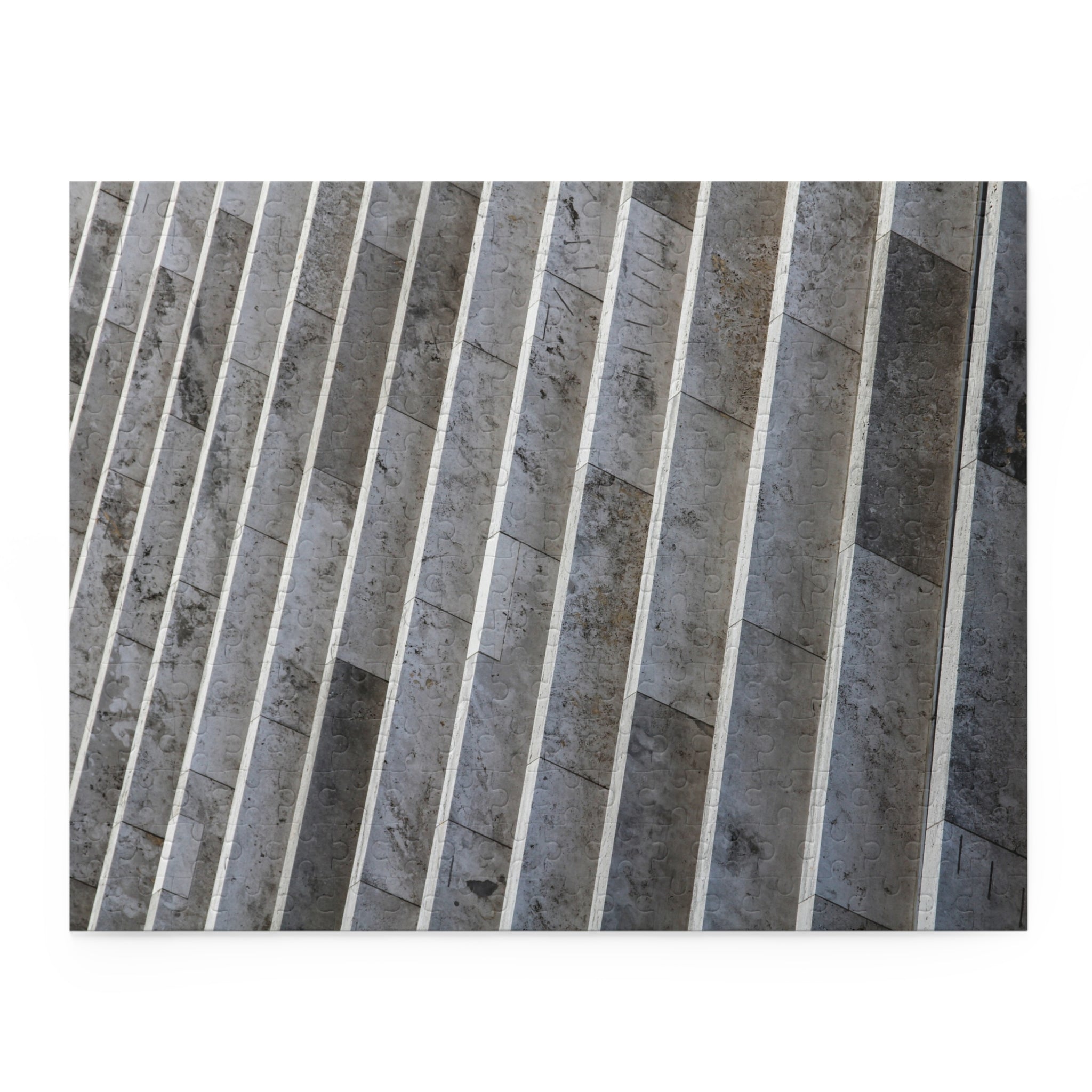 Close-up of a textured stone surface with vertical lines