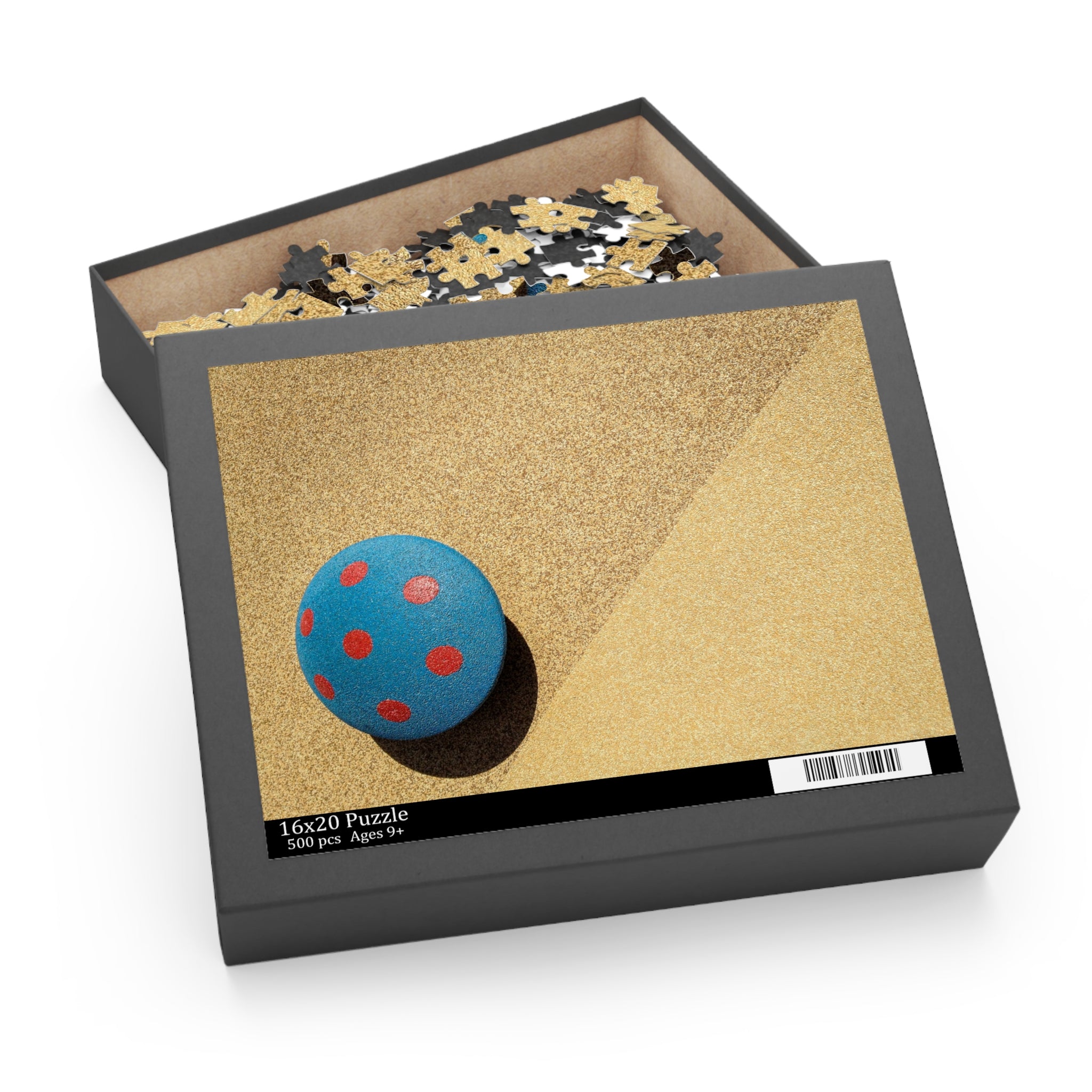 Jigsaw puzzle box with a blue ball puzzle piece on a white background