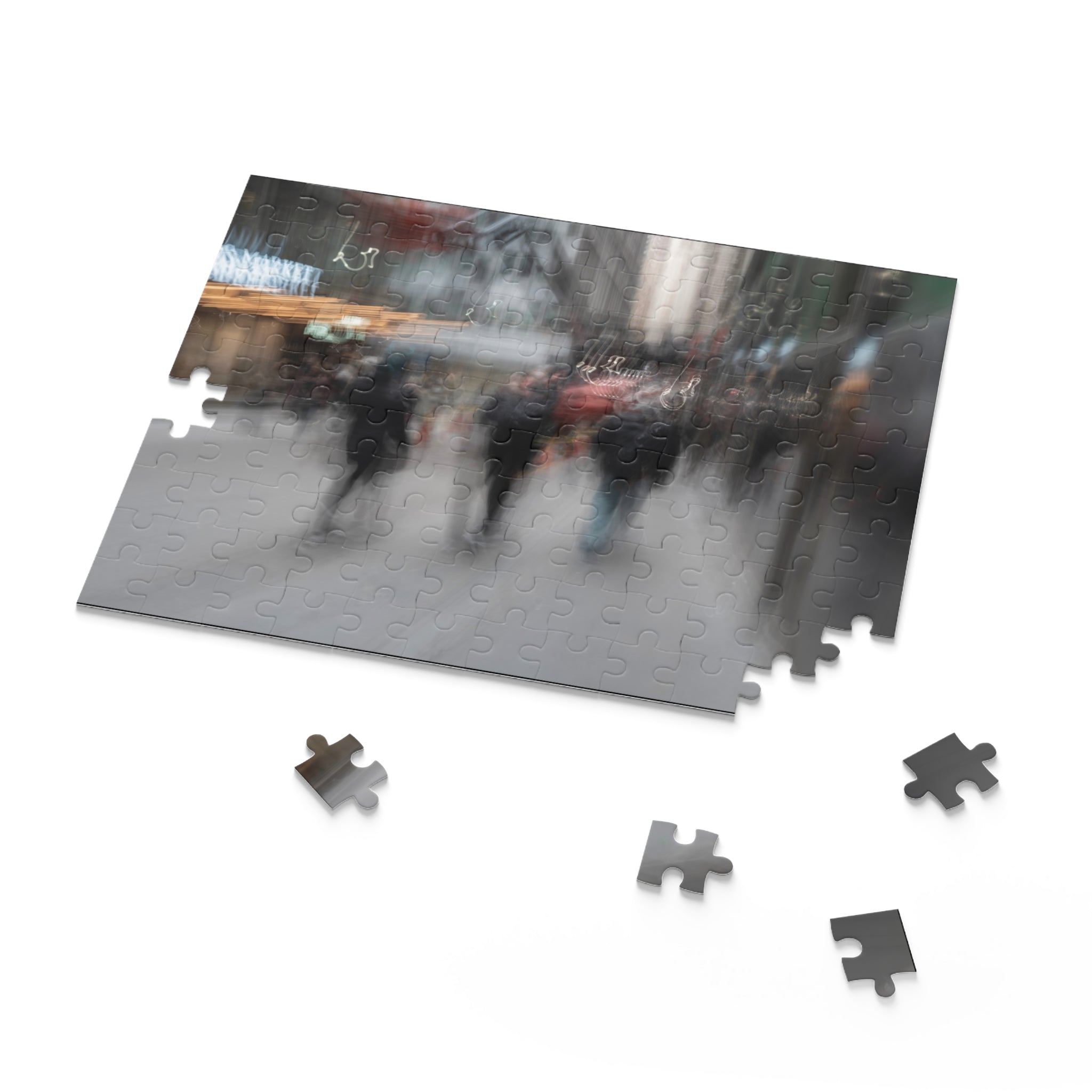 Jigsaw puzzle with a partially completed scene of people on a rainy street.