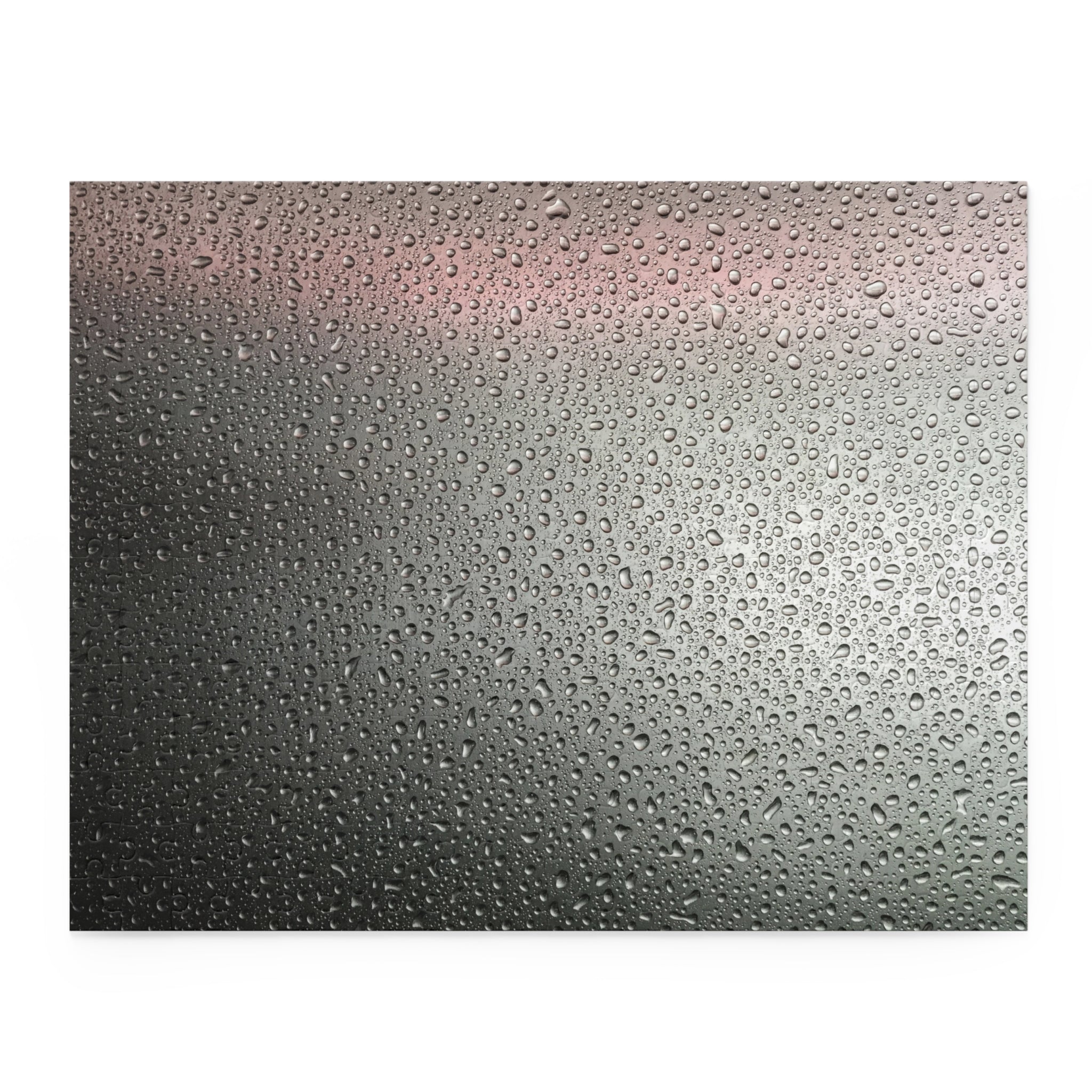 Textured surface with water droplets on a gradient background