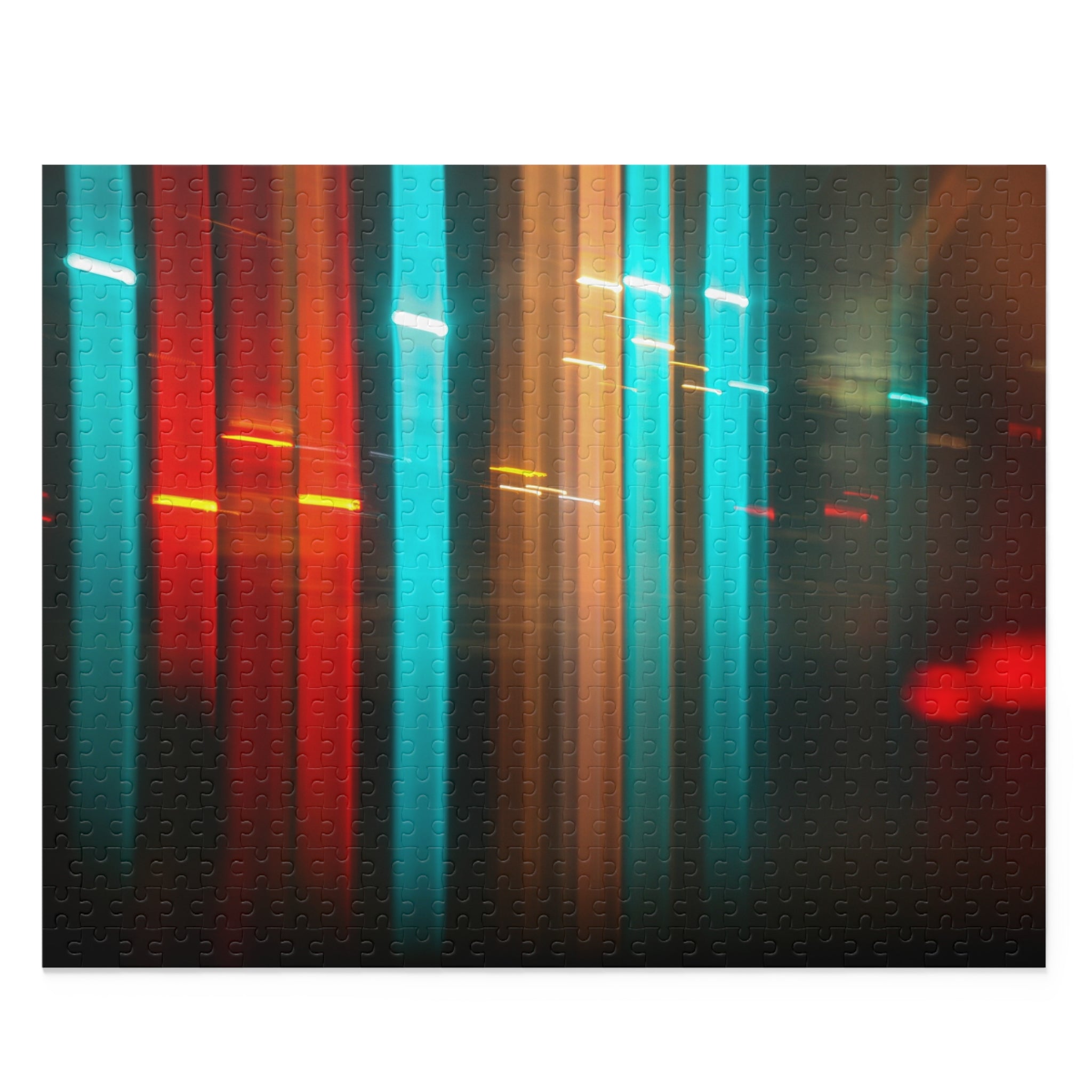 Abstract image with vertical color streaks in red, blue, and green on a dark background.
